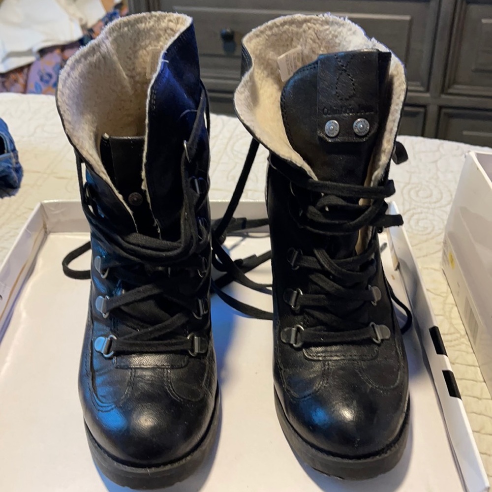 Calvin Klein lace up booties